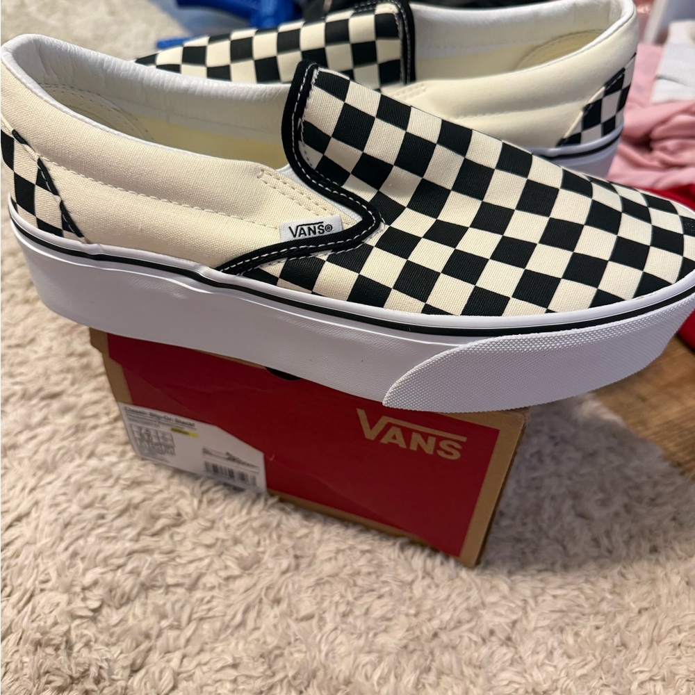 Vans Black and White Checkered Slip-On Sneakers